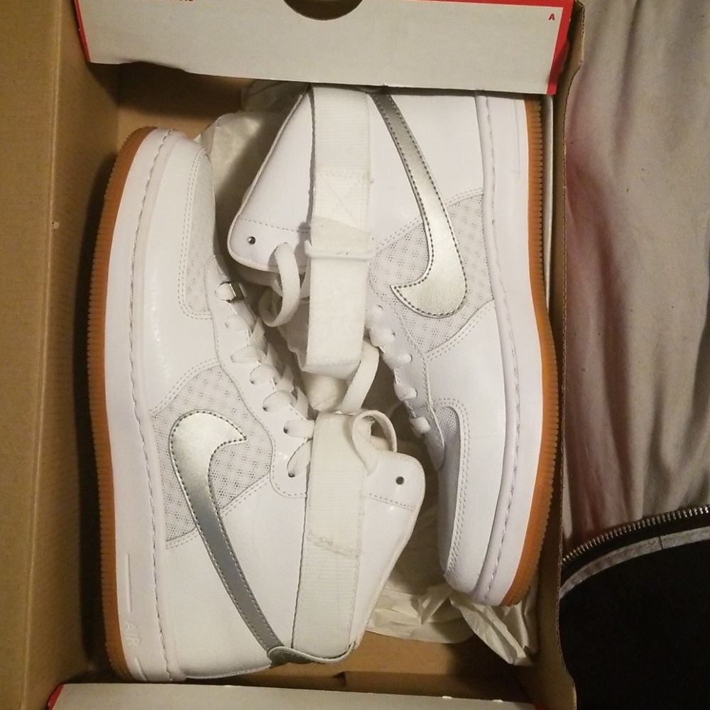 White Nike air force high tops